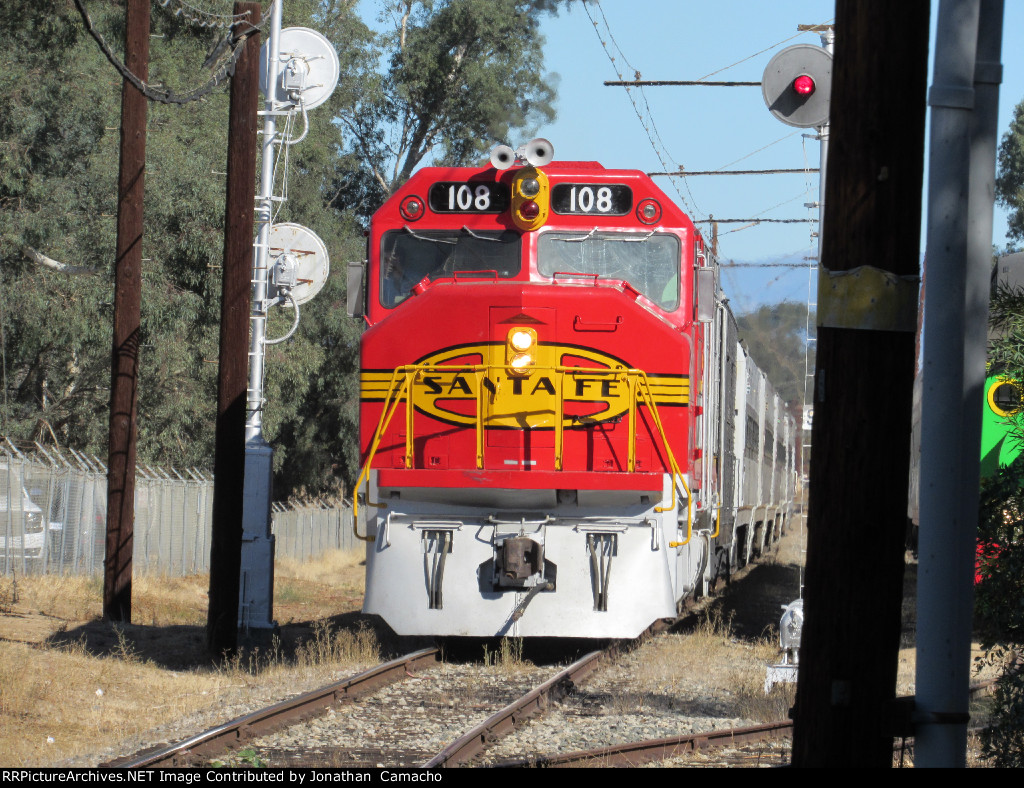 ATSF 108 shoves the Thomas train up the line